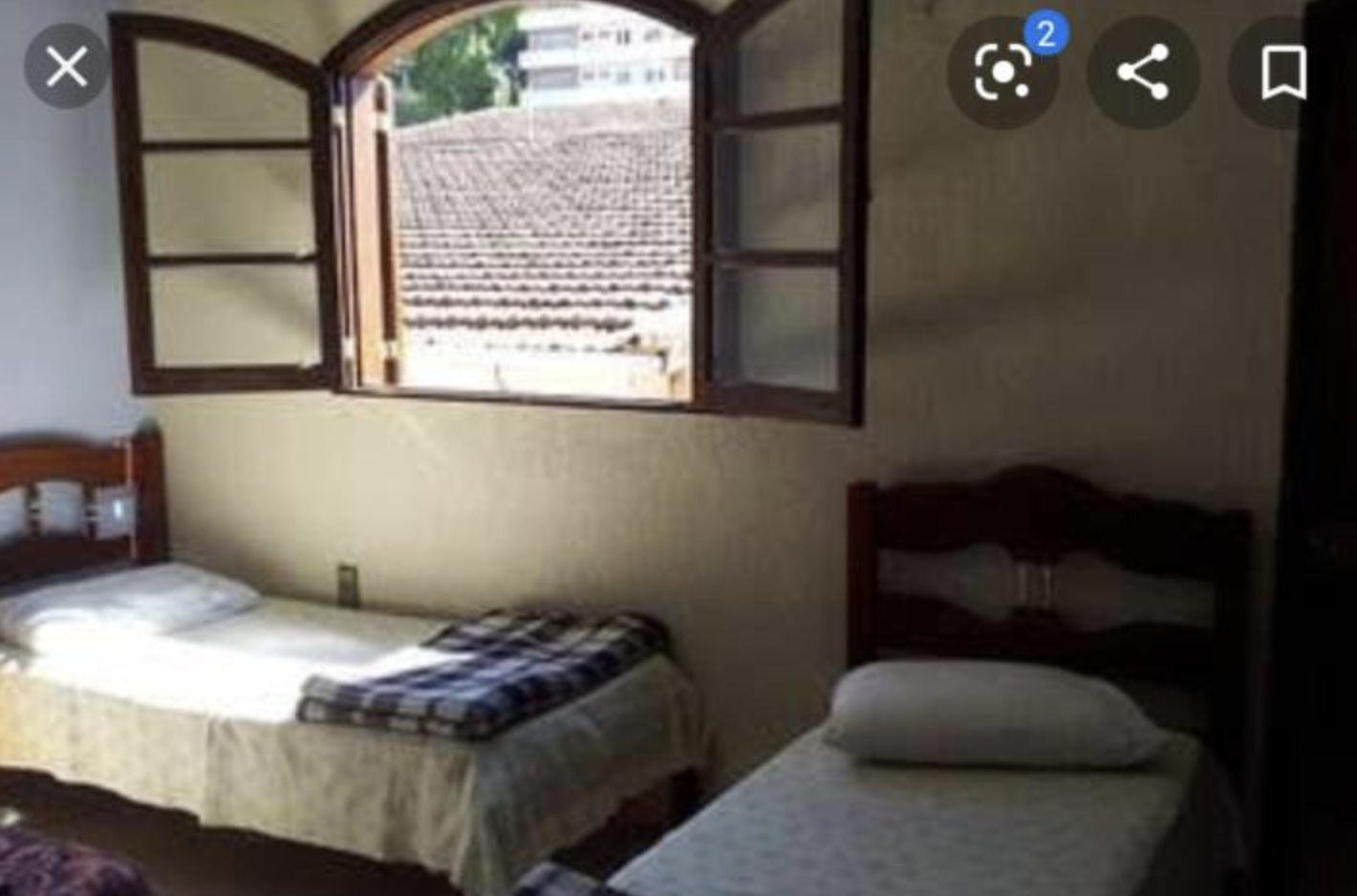 Quarto com camas de solteiro